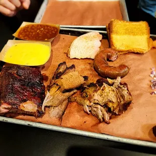 Bog Hog with grits and beans