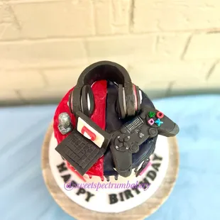 a birthday cake with headphones on top