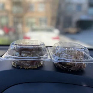 two donuts in plastic containers