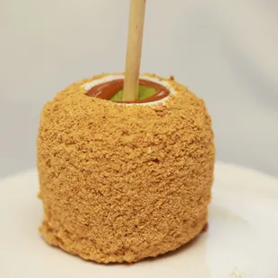 a caramel on a white plate