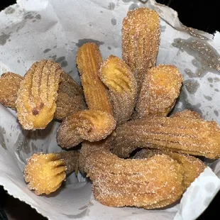 sugar coated doughnuts in a bowl