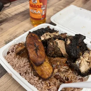 a plate of food with rice and meat