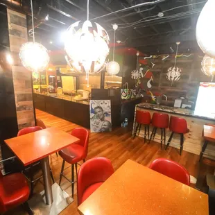a red table and red chairs