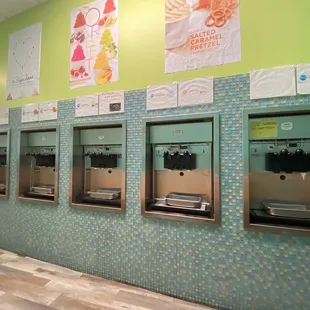 a row of ice cream machines