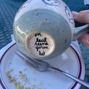 Bottom of my mug; maybe it's a regular's mug that I'm borrowing?