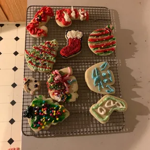 Don&apos;t mind our poor decorating skills! The decorating kit was super fun and the cookies and icing were delicious!