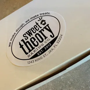 a sticker that reads sweet theory
