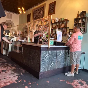 a man and a woman at a counter