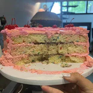 Does that look like chocolate mousse as a filling and birthday cake?  That looks like a box cake!