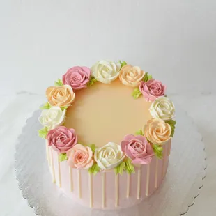a cake decorated with roses