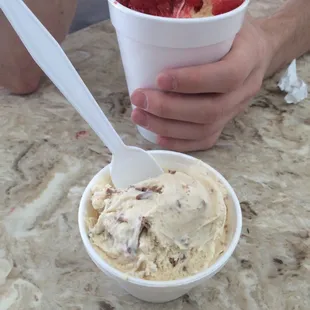 Peanut butter and chocolate chunk ice cream and cherry icey with vanilla ice cream