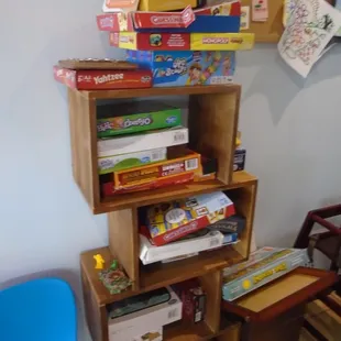 A stack of games in back for the kiddos.