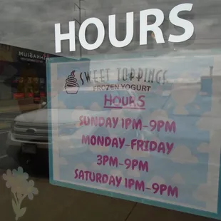Hours of operation, front entry door.