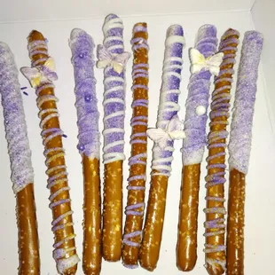 Butterfly themed pretzel sticks dipped or just drizzled if you like less chocolate