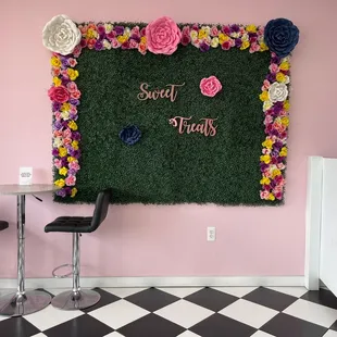a chalkboard with flowers
