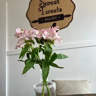 a vase of flowers on a table