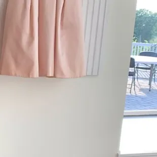 a dress hanging on a wall