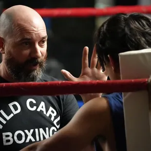 Checking on a boxer during fight night at Sweet Z&apos;s Boxing Gym in KCK