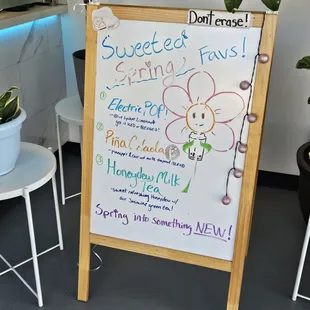 Sign displaying latest Spring drinks (April 2024)