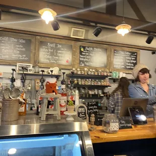 a woman behind the counter