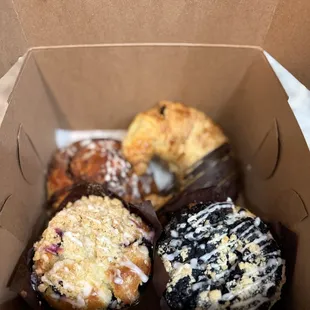 Chocolate croissant, cinnamon roll, black bottom and blueberry muffin pastry bundle.