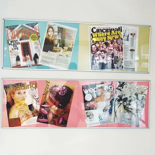 a bunch of magazines on a wall