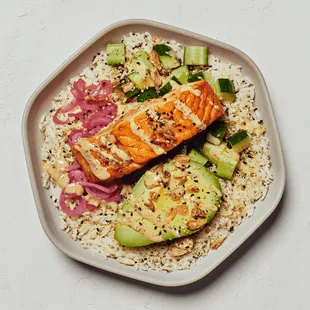 a plate of food with salmon and rice