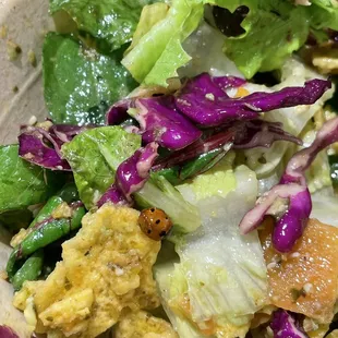 a salad in a plastic container