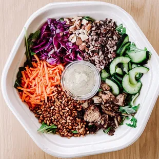 a salad in a bowl with dressing