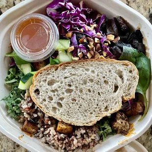 My bowl (Tofu, wild rice, kale based) - came with a slice of sourdough bread (the actual name of the bowl is Shroomami)