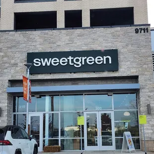 a car parked in front of a store