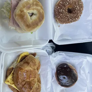 #22 (turkey and ham bagel I think) #1 bacon egg and cheese on croissant Almond donut Boston cream donut