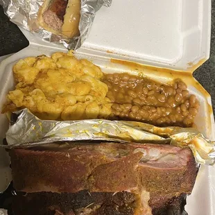 Half slab meal minus one bone, ate before picture was taken due to extreme hunger. Came with two slices of bread (tossed the extra carbs).