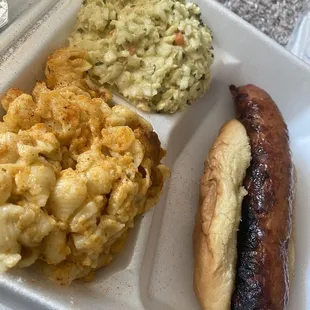 a hot dog and macaroni and cheese