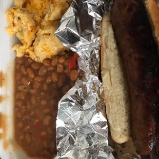 Sausage with baked Mac and cheese and baked beans