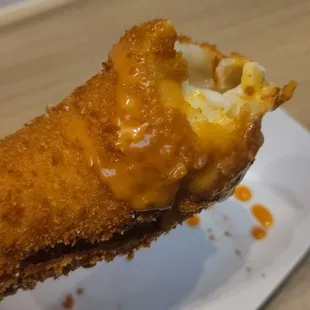 ows a piece of fried food
