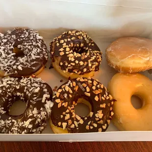 a variety of donuts in a box