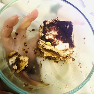 a piece of cake in a glass bowl