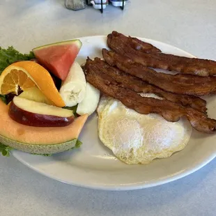 Look at this fruit, there&apos;s a fresh pineapple  wedge in there too. It was a nice plate, very filling.