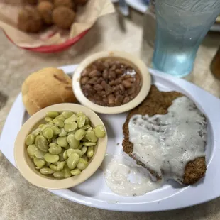 Country fried steak, lima beans, and pinto beans