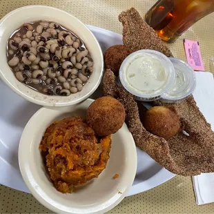 Catfish, purple hulls, sweet potato casserole, hush puppies