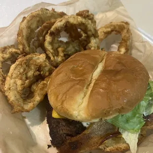 Bacon Cheeseburger stack talk with condiments and fresh cut lightly battered onion rings!