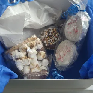 Dark chocolate covered citus ribd, s&apos;more bar, dipped Oreos, fancy truffles