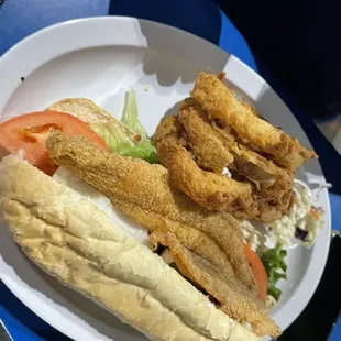 Catfish Po-Boy. Wit' da Onion Rings