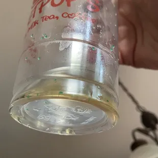 This is what was at the bottom of the drink it is green stuff.