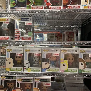Peanuts and a Tina Belcher Funko