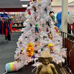 a white christmas tree with toys