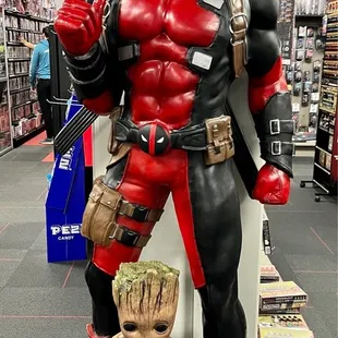 a deadpool statue in a store