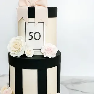 a black and white 50th cake