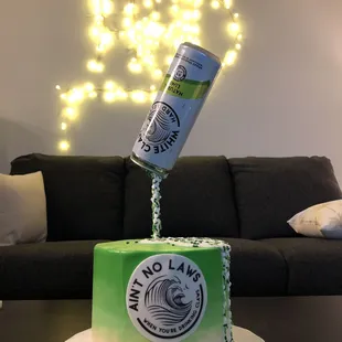 "White Claw" Cake (chocolate cake inside with raspberry buttercream filling)